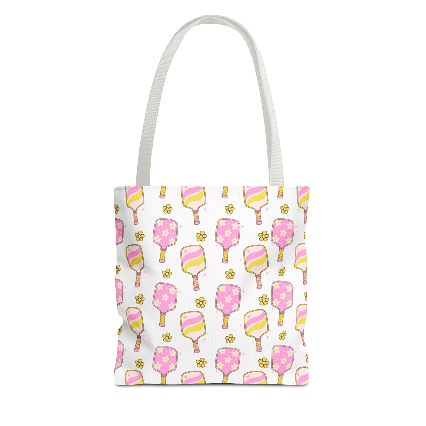 white polyester tote bag with pattern of light pink and yellow pickleball paddles