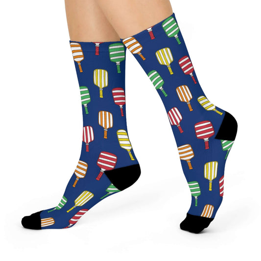 Navy calf length crew socks with colorful pickleball pattern filling the socks