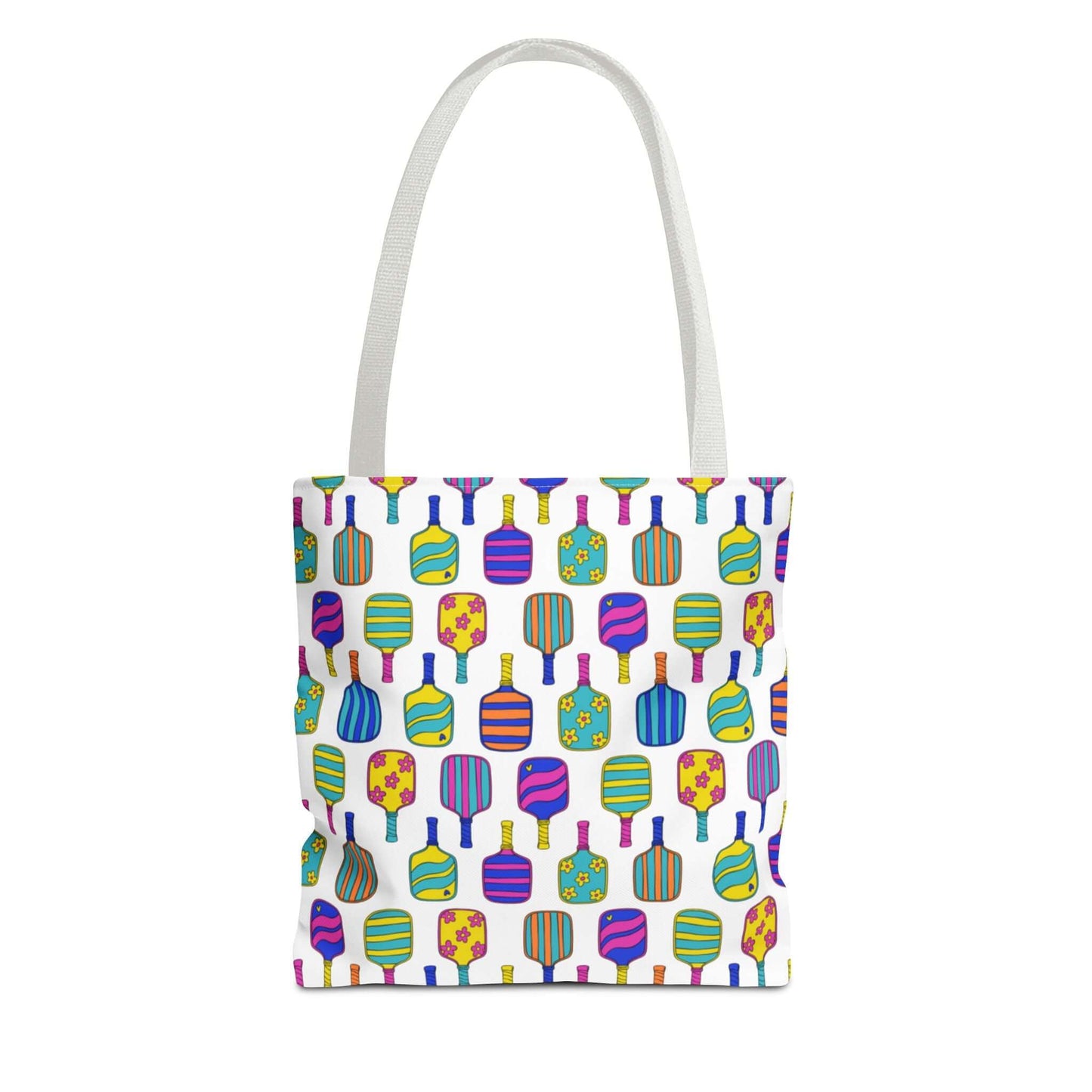white tote bag with colorful pattern full of the best pickleball paddles