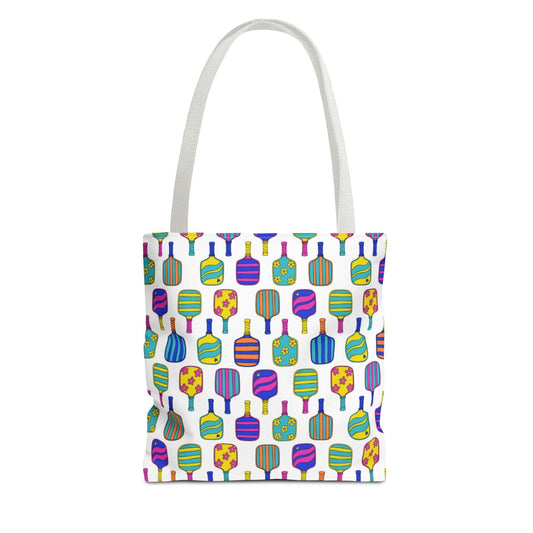 white tote bag with colorful pattern full of the best pickleball paddles