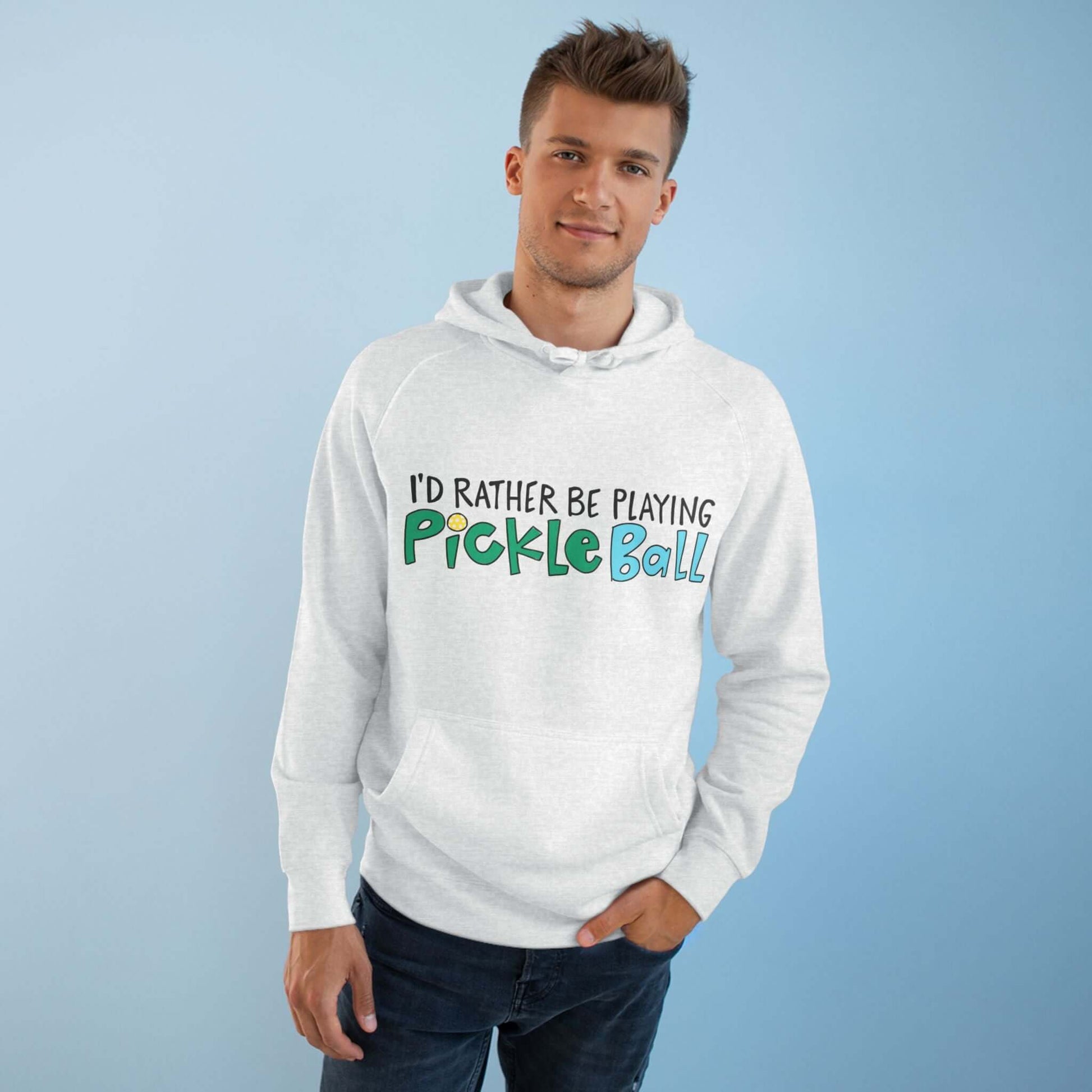 Man in Light Gray hoodie with 'I'd Rather Be Playing Pickleball' on front in colorful handlettering